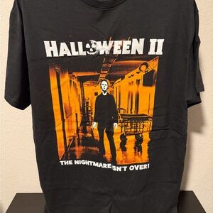 Black and Orange Halloween II “The Nightmare Isn’t Over” Tee